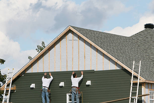 Professional Siding technician working in South Fork, PA